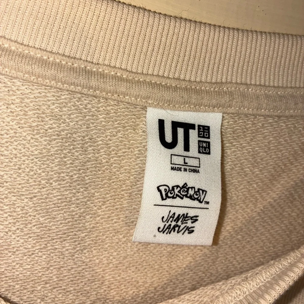 Uniqlo Pokemon x James Jarvis UT Tan My Memory Fails Me Sweater Psyduck Sz L - Picture 6 of 6